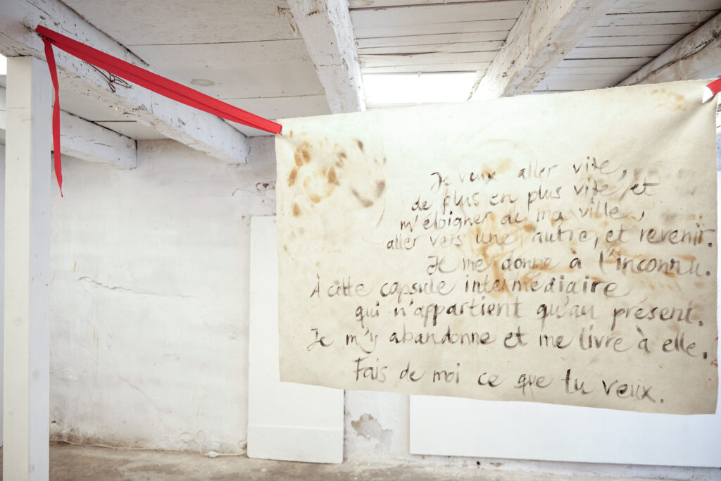 writing on the back of a print by artist Laura Mahnke